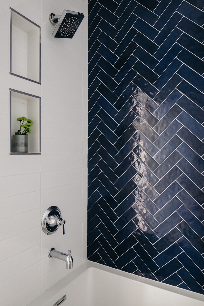 Modern Shower walls with white tile and navy tile.