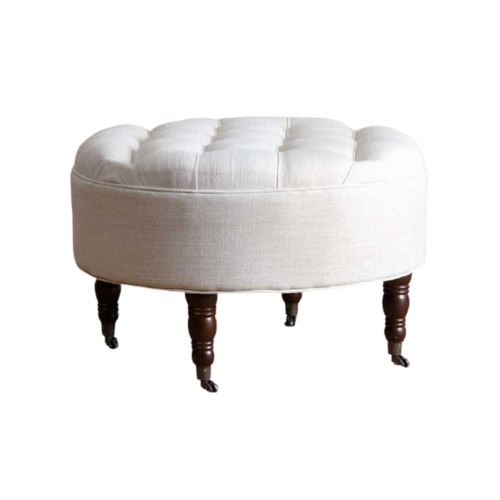 White upholstered ottoman with dark brown wooden legs