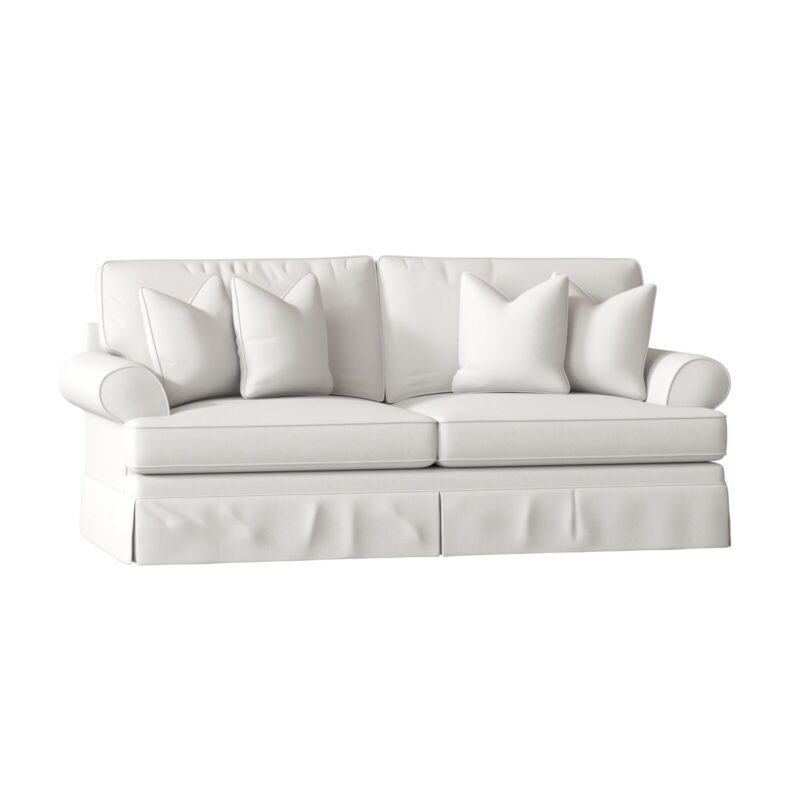 white upholstered sofa with rounded arms