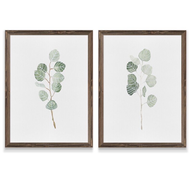 Wood framed artwork of eucalyptus branches with leaves