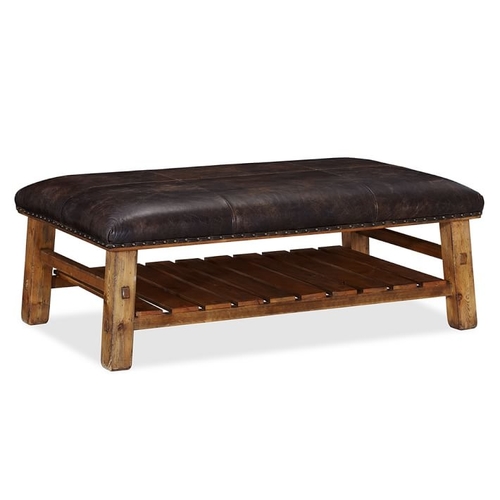 Wood based ottoman/coffee table with leather upholstered top