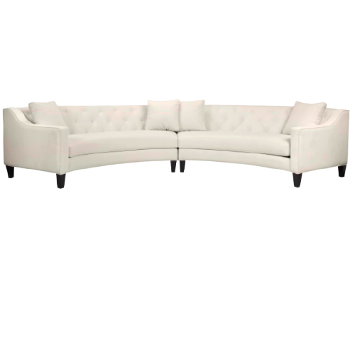 White curved 2-piece sectional sofa with dark brown legs and a slightly tufted back
