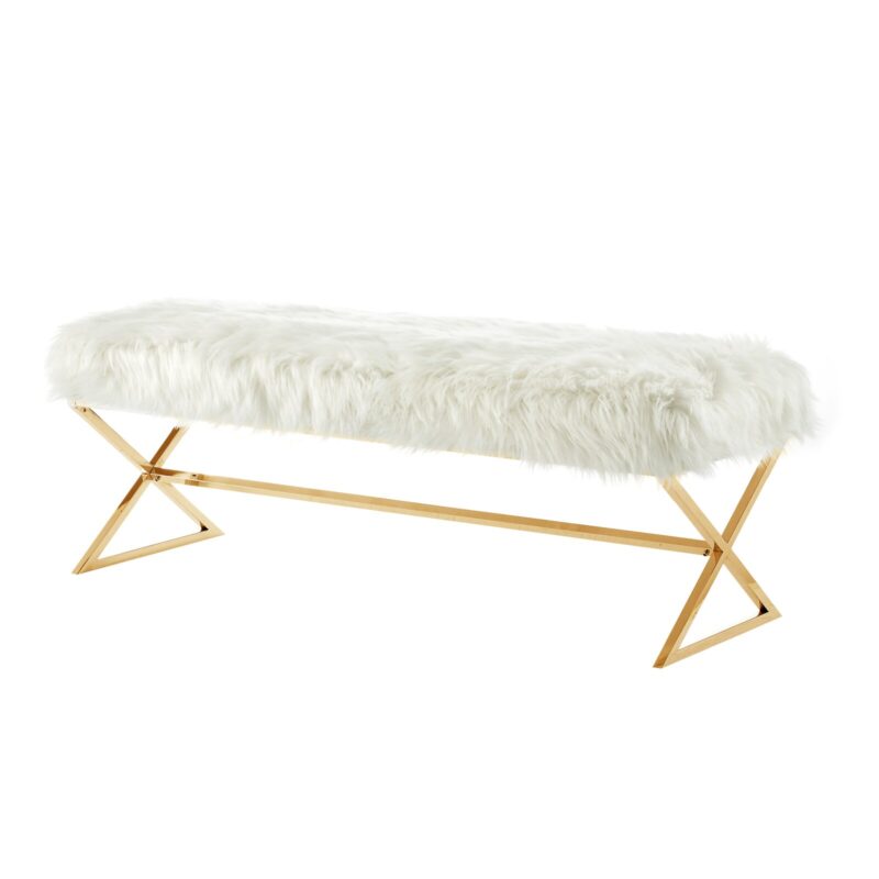 Bench with gold x shaped legs and a white faux fur upholstered top