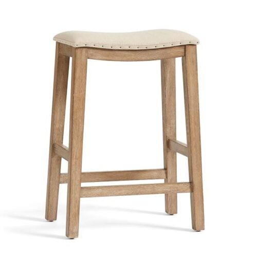 light colored wood stools with cream colored upholstered fabric