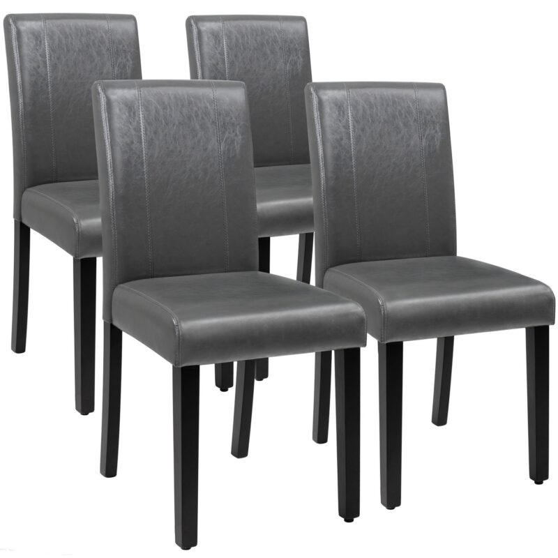 Dark gray upholstered chairs with no arms and dark wood legs, set of four
